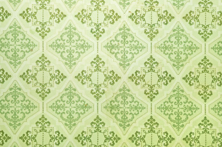 Old green wallpaper for texture or backgroundの写真素材