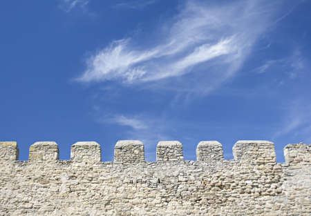 Merlons of an old fortress wall in a sunny dayの写真素材