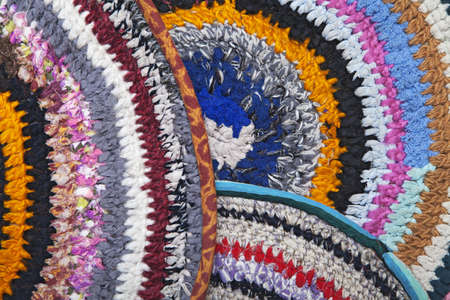 Handmade rugs crocheted of colorful fabric ribbonsの写真素材