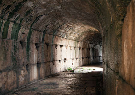 Narrow corridor in an ancient greek amphitheaterの写真素材