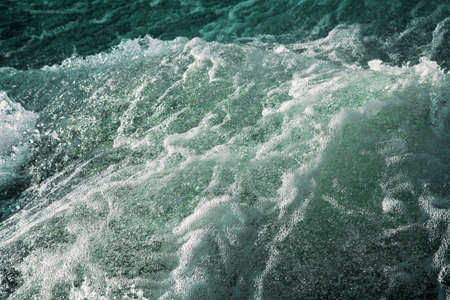 Turbulent water of a river as background