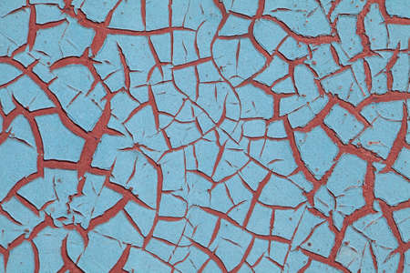 Close-up of peeling paint and rust on a wallの写真素材