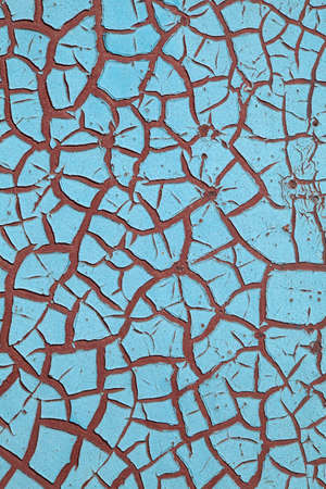 Close-up of peeling paint and rust on a wallの写真素材