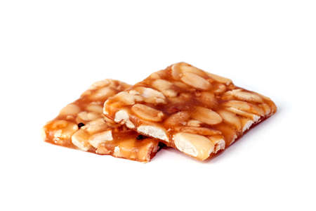 Indian sweet brittle bars isolated over white
