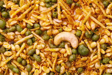 Dry roasted Indian snack mix, close-up backgroundの写真素材