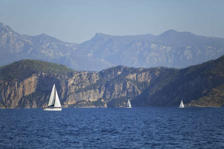 Yachting in Turkey - view of yachts and mountains from the seaの写真素材