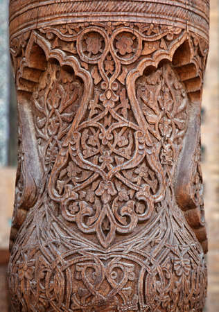 Detail of traditonal carved wooden column, Uzbekistanの写真素材