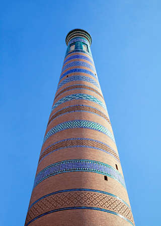 Minaret of a mosque in Uzbeki style, view from belowの写真素材