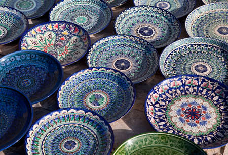 Traditional ceramic dishware in a street market, Uzbekistan
