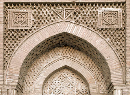 Carved ornament of an arch portal of a mosque, Uzbekistanの写真素材