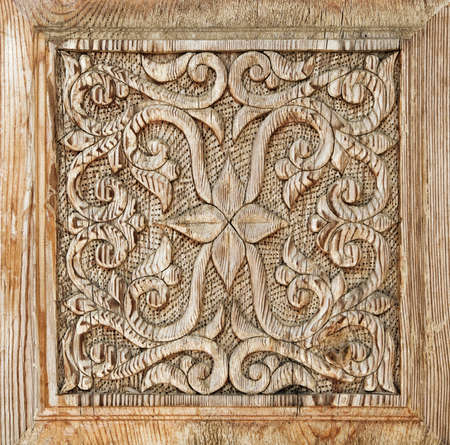Close-up of a traditional carved wooden door, Uzbekistanの写真素材