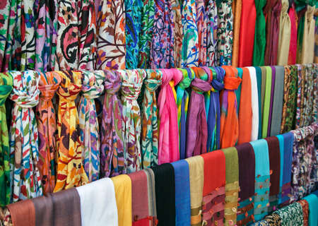 Colorful scarves on an oriental bazaar marketの写真素材