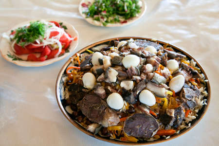Uzbek national dish pilaf on a plateの写真素材