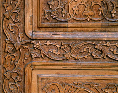 Close-up of a traditional carved wooden door, Uzbekistanの写真素材