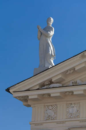 Statue on the roof of the Vilnius cathedralの写真素材