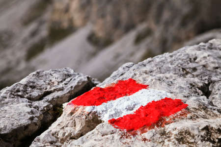 Trail mark on a stoneの写真素材