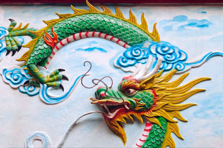 Dragon decoration of a temple in Vietnamの写真素材