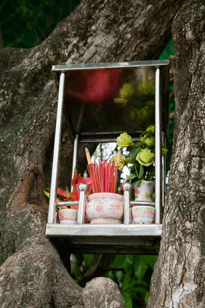 Small box with incence and offerings to godsの写真素材