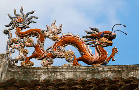 Dragon on a temple roofの写真素材