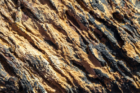 Corded lava close-up in Teide National Park, brown lava texture, geology, volcanic land