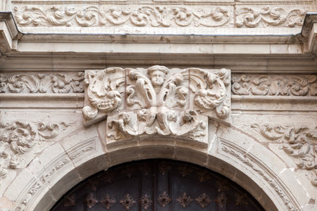 The intricate carved arch showcasing detailed craftsmanship from a historic eraの写真素材
