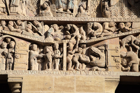 Stone reliefs showcase detailed figures and events from history, offering insight into the art of...