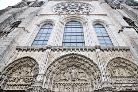 Intricate stone carvings at Chartres Cathedral display remarkable artistry and craftsmanship.の写真素材