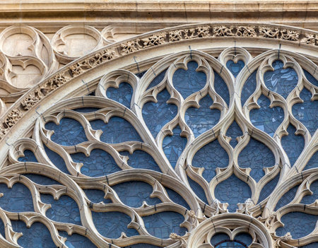 The stunning stained glass window at Sainte-Chapelle illuminates the interior with vibrant colors...
