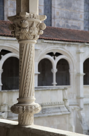 Ornate column in Monastery Santa Maria, showing detailed carvingsの写真素材