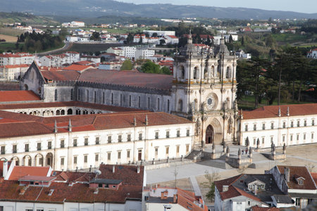 Views of Monastery Santa Maria show its impressive Gothic architecture and expansive grounds in Alcobaca, Portugalの写真素材