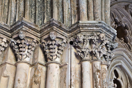 Columns adorned with human faces and floral patterns showcase the 14th-century artistry of the monastery's construction.の写真素材