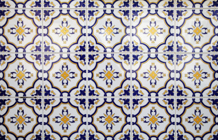 Detailed azulejo tiles feature blue and yellow patterns typical of Portugal's architectural heritage