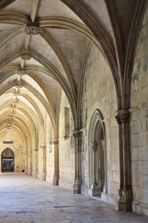 A view of Batalha monastery's gothic arches, showing its elegant architecture and fine craftsmanship.の写真素材