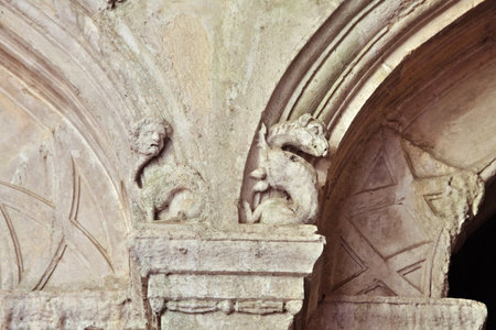 Carvings adorn the columns within Convento de Cristo, showing detailed craftsmanship from centuries pastの写真素材