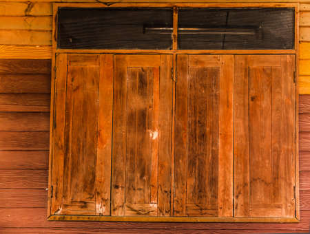 Horizontal wooden window of an old 