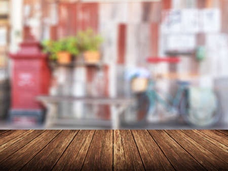 Wooden top board empty table in front of blurred background. Perspective wood over nature view  for display or montage your products.の写真素材