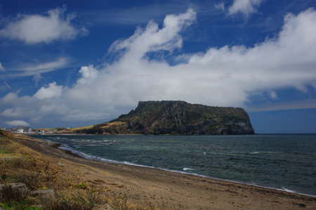 View of the sea and the mountains of the island of Jejuの写真素材