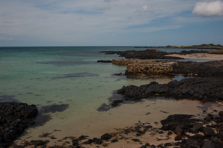 Walking on the East Coast of Korea at sunsetの写真素材