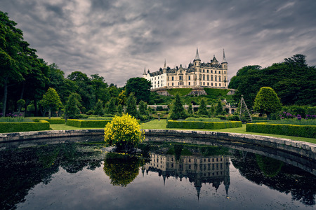 DUNROBIN CASTLE, SCOTLAND - JULY 6, 2016: Dunrobin Castle at Golspie in the Highlands of Scotland, seen from the gardens.のeditorial素材