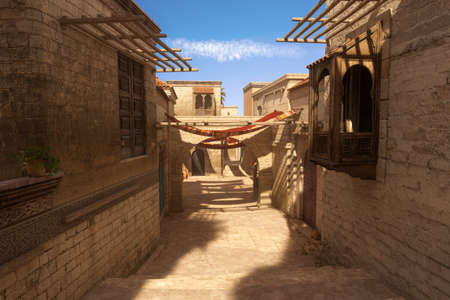 3D rendering of an alleyway in an old medieval Arabian town with bright sunlight and blue sky.の写真素材