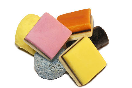 Several pieces of English liquorice isolated on a white backgroundのeditorial素材