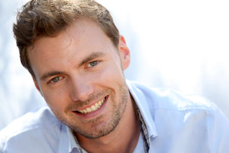Portrait of handsome man with blue shirt Portrait of handsome man with blue shirt