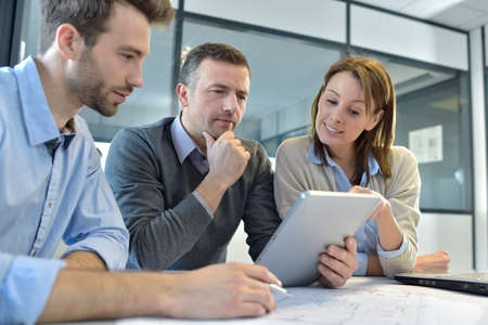 Business people meeting around table Business people meeting around table
