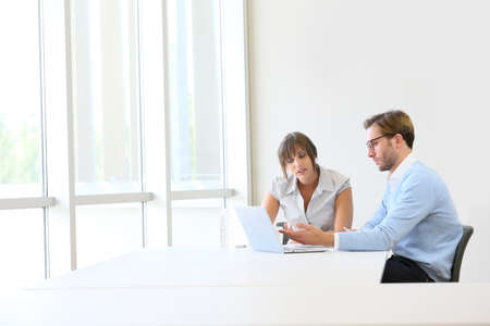 Business partners working on project, copyspace Business partners working on project, copyspace
