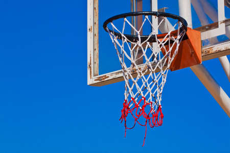 This is a Old Basketball hoops on blue skyの写真素材