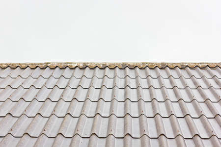 This is a Tile roof on gray sky