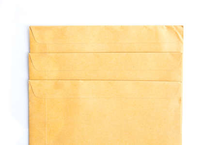 brown document case stacked on white floor