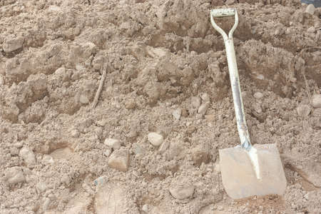 steel Shovel on the sandの写真素材