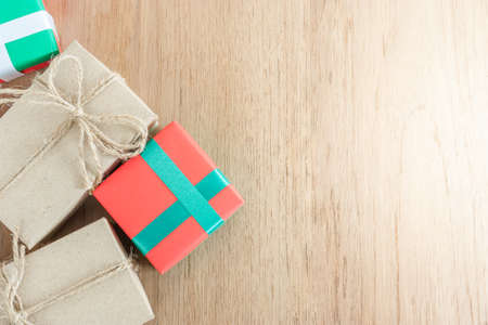 gift box on wood texture with copy space on right sideの写真素材