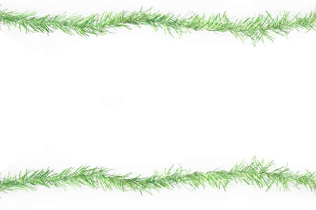 green tinsel frame on white backgroundの写真素材